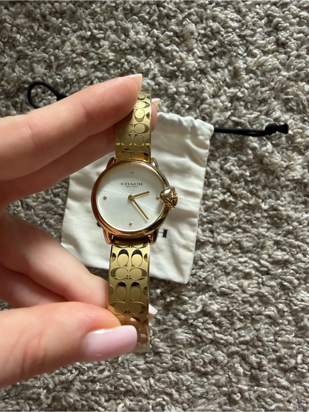 COACH Gold-Tone Signature Pattern Bangle Watch with White Dial